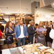 Dr. Lezli Levene Harvell (r) greets the crowd in one of the Viking showroom’s stunning display kitchens.